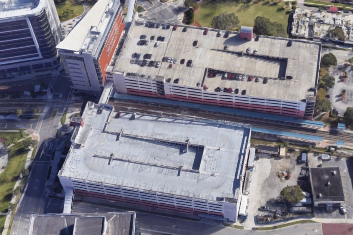 The image shows the top view of a hospital building in a suburban area representing ALPR case studies