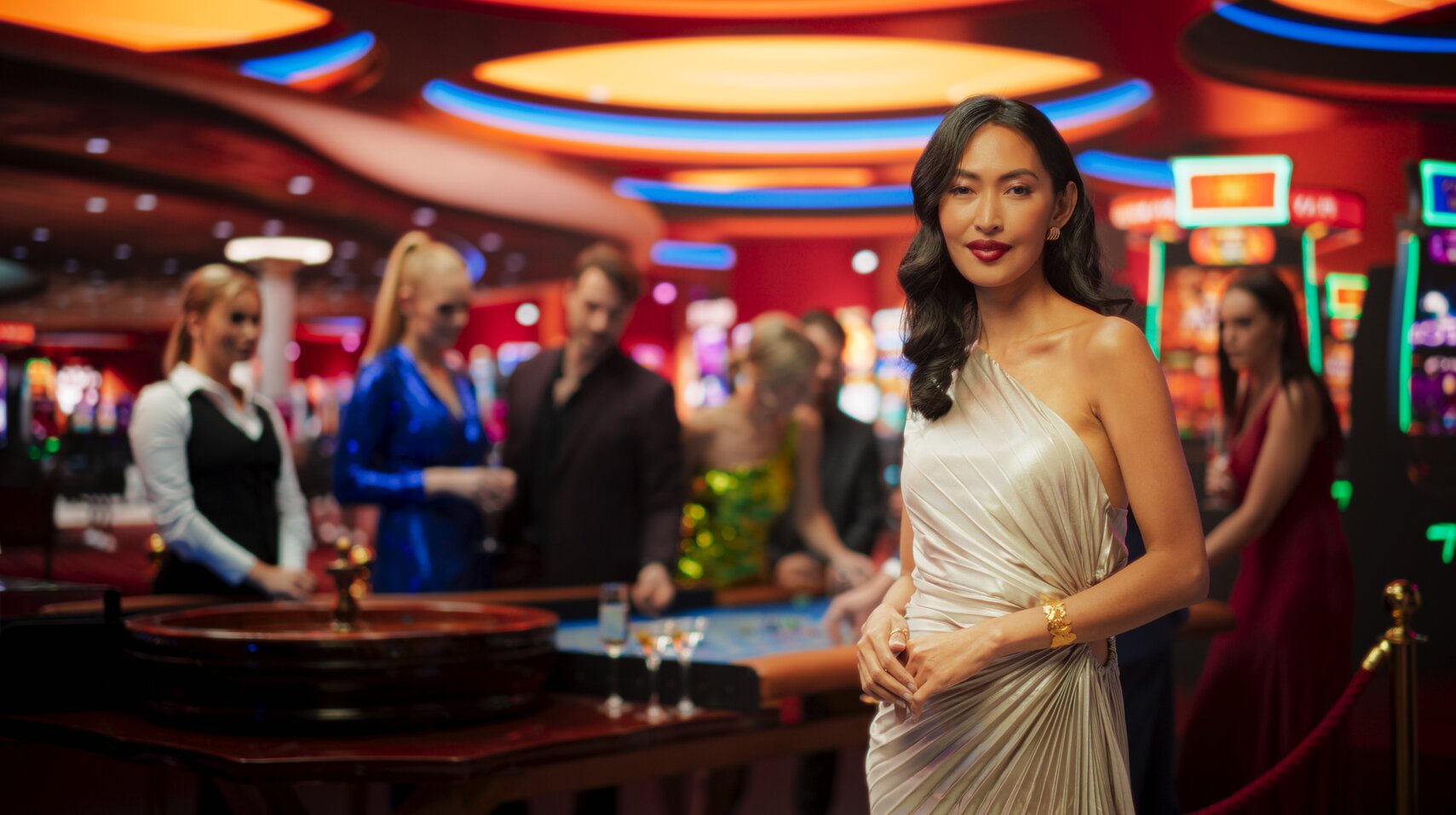 A concierge welcoming high value guests inside a casino