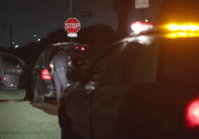 Stock photo depicting police searching the boot of a suspect car stopped during a domestic terrorism investigation