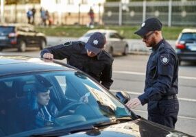 The photo with a private security team checking a suspicious vehicle shown to demonstrate perimeter security with ALPR